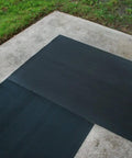 Fine Rib Corrugated Rubber Floor Mat Runner 3 Ft By 20 Ft Black No Slip Built Tough Debris Scraper on concrete and grass