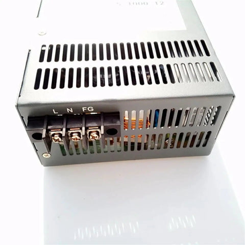 Close-up of 15V 80A 1200W Switching Power Supply for CNC Machines CCTV Systems and LED Lighting, showing terminal connections.