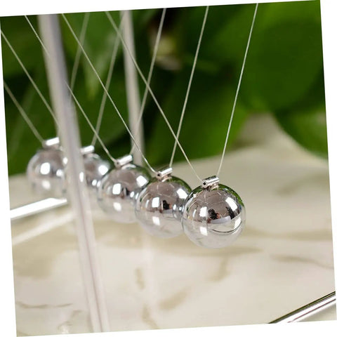 Must Have Pendulum Frame Physics Desk Toy For Learning And Decor, Cradle Style Science Education Gadget, silver metal balls close-up
