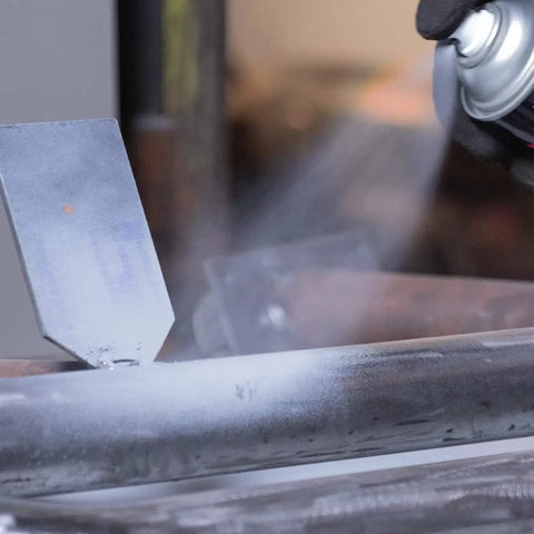 Professional Self Etching Weld Through Gray Primer For Metal Surfaces With Zinc Enhanced Coating spray being applied to metal.