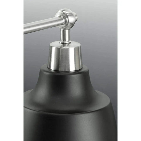 Close-up of Bramlett Brushed Nickel Two Light Bath And Vanity Fixture With Matte Black Shades And Back Plate, showing shade connection.