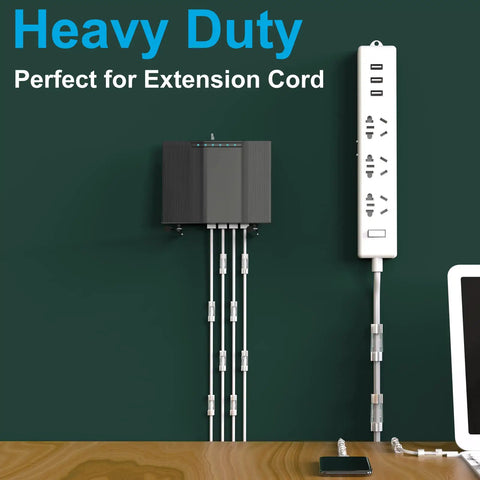 Heavy duty extension cords organized with 60 Pack Assorted Cable Clips For Outdoor And Indoor Use on a green wall.