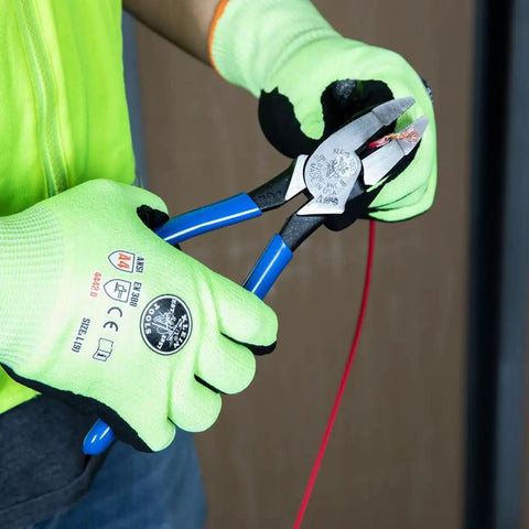 Person using D2000-9NE Side Cutter Lineman's Pliers 9 Inch Heavy Duty Built To Last High Leverage Tool on red wire.