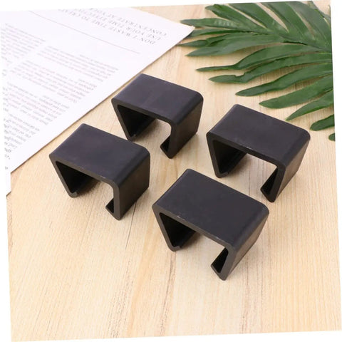 Four Pack Sturdy Chair Clips For Rattan Furniture, Sofa Fasteners And Corner Connectors on wooden surface
