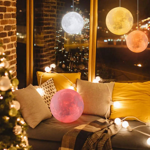 Cozy interior with Moon Glow 5.9 Inch Moon Lamp with 16 Colors Dimmable And Rechargeable Lunar Night Light illuminating a living room.