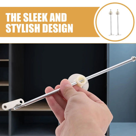 Two Pack Iron Round Disc Cabinet Hinges With Lid Support shown in hand against cupboard background.