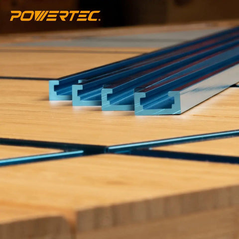 Rock Solid 24 Inch Double Cut Universal T Track Kit With Bidirectional Short Stops And Wing Nuts Shop Ready Heavy Duty Aluminum Slot Rail System For Table Saw Jigs And Router Table Setup, showing four aluminum tracks on wood.
