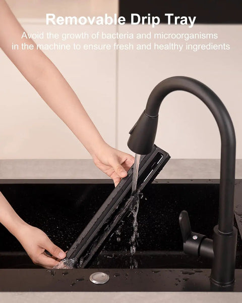 Hand washing removable drip tray of Automatic Vacuum Sealer Machine With One Touch Operation Keeps Your Grub Fresh For Weeks.