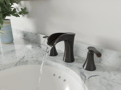 Jaida 8 Inch Widespread Bathroom Sink Faucet With Two Handles For 3 Hole Vanity Spot Defense Brushed Nickel Finish Easy Clean Includes Valve And Cartridge water flow from faucet on marble countertop