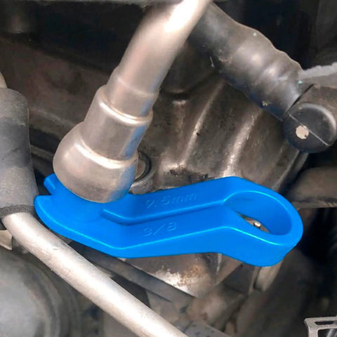 Close-up of blue tool from 7 Piece Fuel Line Disconnect Tool Set With 1/4 5/16 3/8 1/2 5/8 3/4 7/8 Inch Openings, Quick Disconnect Kit For Ford GM Chrysler Mazda