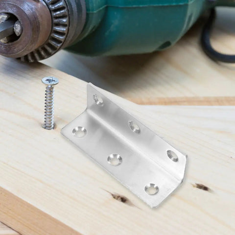 8 Pack Stainless Steel L Shaped Corner Brackets For 90 Degree Furniture And Cabinet Support on a wooden surface with drill and screw