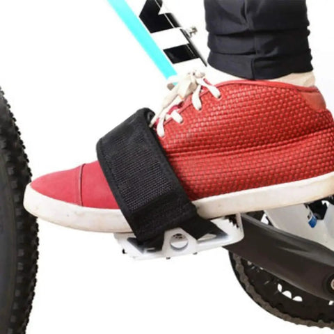 Person wearing red sneaker using 2 Pack Black Pedal Straps For Fixed Gear And Kids Bikes With Toe Clips Tape Durable Nylon And Easy Install.