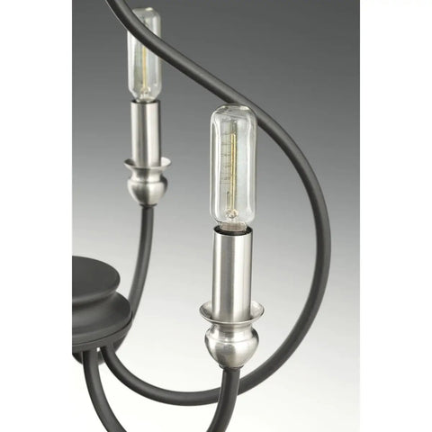 Close-up of Whisp Collection 4 Light Farmhouse Chandelier In Graphite Black Finish With Candled Scroll Frame Classic Yet Modern Ceiling Light