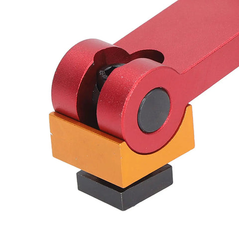 Precision Adjustable Vise Stop Locator For CNC Mill And Lathe Work Tables close-up showing red and orange components for precise adjustments.
