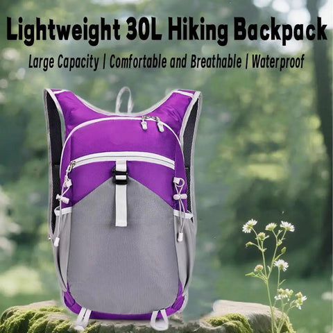 Purple and gray lightweight backpack with white accents on a forest background