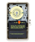 Heavy Duty T101P3 Time Switch in plastic enclosure with teeter terminals visible, dial showing time settings and warning label.