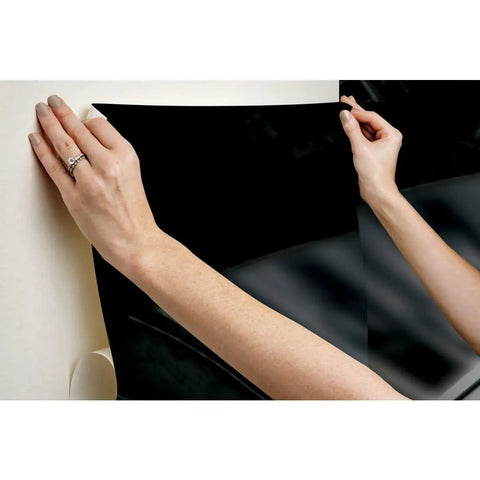 Hands installing Star Wars Millennium Falcon Peel And Stick Wallpaper Mural For A Dope Room Makeover No Mess Easy To Install And Remove 10.5 Feet By 6 Feet Big Wall Decor