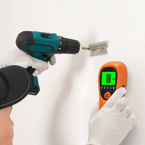 Person using No More Blind Swinging Drill Holes 5in1 Stud Finder Wall Scanner with drill on wall stud.