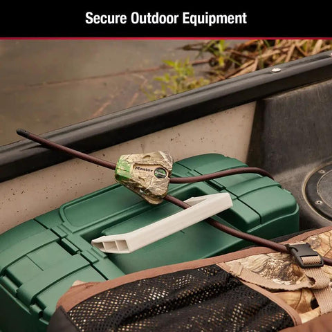 Keyed Alike Python Trail Camera Locking Cables Six Foot Camouflage secured on green outdoor gear in a boat.