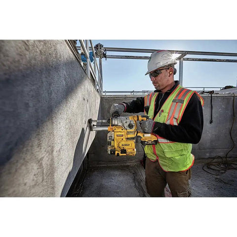Heavy Duty Cordless 20V Brushless Rotary Hammer Drill Sick Power Bad Boy in use for concrete drilling by a worker.