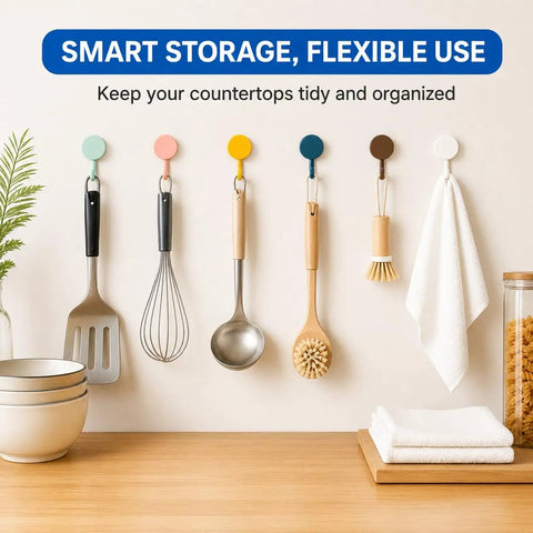 Sixteen Pack Dead Easy Colorful Adhesive Wall Hooks Self Stick Strong Tape No Drill Renter Friendly Low Key Decorative Style Quick Mount Organization For Any Space Major Room Refresh hanging kitchen tools on a wall.