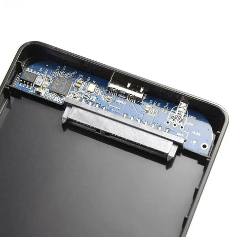 Inside view of 2.5 Inch Usb 3.0 Sata Hard Drive Enclosure showcasing circuit board and USB connection ports.