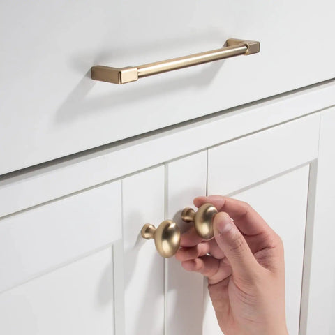 5 Pack Classic Solid Cabinet Handles In Champagne Bronze, 8 Inch on white cabinet with hand holding knobs