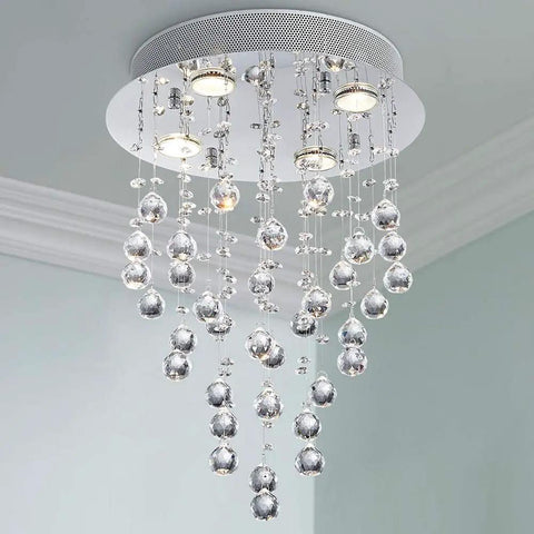 Lit Modern Crystal Round Raindrop Chandelier Flush Mount LED Ceiling Light Fixture with crystal droplets and chrome finish.