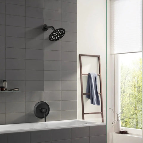 Sleek Matte Black Shower Head And Faucet Trim Kit Featuring Six Inch High Pressure Rainfall Spray And Smooth Single Handle Mixer Valve For Major Bathroom Glow Ups in modern bathroom setting.