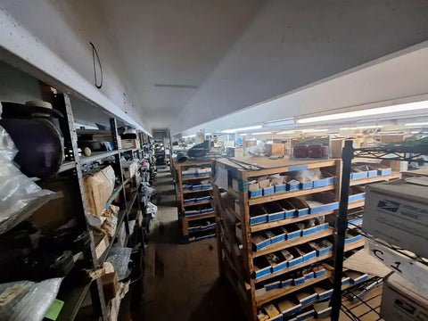 Warehouse storage with shelves holding Marine Pump Cartridge For 500 GPH Bilge Motor Replacement Upgrade products.