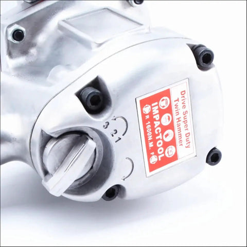 Close-up of the 3/4 Inch Pneumatic Impact Wrench Featuring A Gutsy Twin Hammer System with drive assembly and brand label.