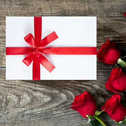 Heavy Duty Corrugated Shipping Boxes Crafted From Recyclable White Cardboard Mailers Ten By Seven By Five Inches Set Of Twenty Five with red ribbon and roses.