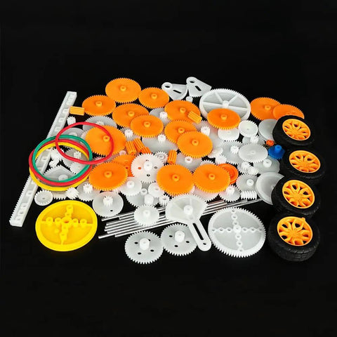 112 Piece Plastic Gear Set For DC Motors And RC Cars DIY Robots And Model Toys on display with gears, tires, and belts