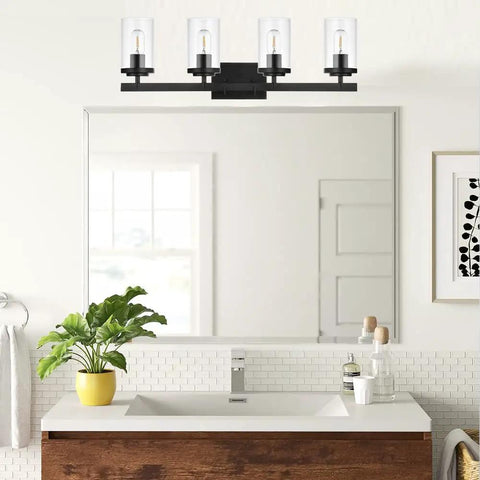 Brushed Brass 5 Light Farmhouse Vanity Lights With Clear Glass Shades in modern bathroom setting, above mirror