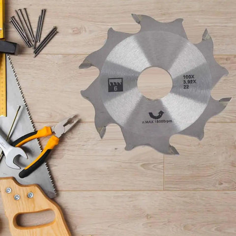 Professional Tungsten Carbide Biscuit Jointer Blade 100mm With 22mm Arbor Precision Woodworking Saw Replacement on wooden surface.