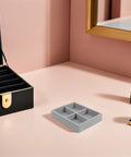 Prime Velvet Jewelry Organizer Tray With Four Grid Sections Stackable Display Holder For Watches Bracelets Rings Dope Compact Storage Setup To Keep All Your Bling Tight At Home on soft surface.