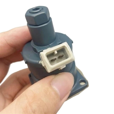 Hand holding Top Shelf 9218234 Proportional Solenoid Valve For Heavy Duty Excavators Hitachi ZAX Series 4 Pin Square Plug.