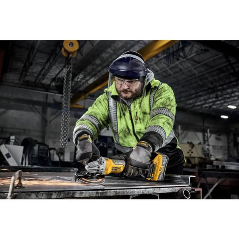 Worker using 20 Volt Brushless Cordless 4 To 5 Inch Angle Grinder Featuring Anti Rotation Safety Shutdown And High Torque Motor Tool Only for steel cutting.