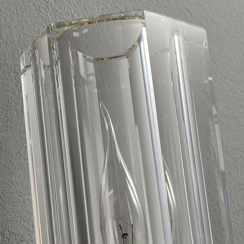 Close-up of geometric cylindrical glass shade of Super Sleek Modern Copper Brass Wall Sconce For Bedroom Bedside And Living Room E14 Compatible Accent Lamp.