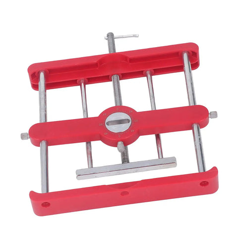 Dead On Mortise Tenon Jig Woodworking Doweling Kit showing red plastic frame with metal rods, designed for precise joint alignment.