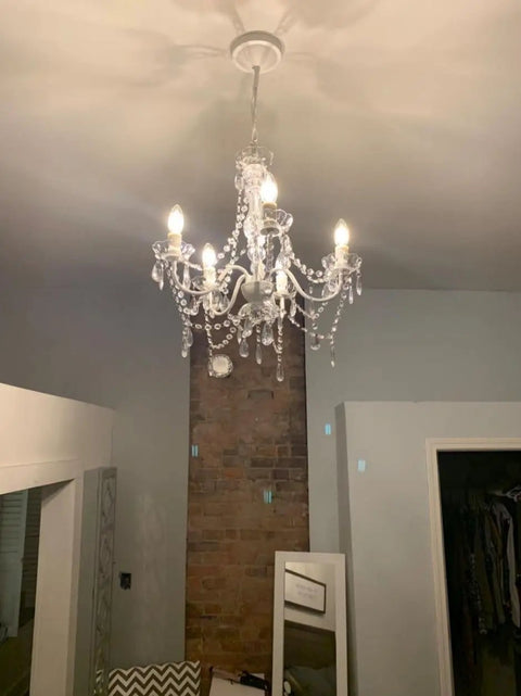 Original Brink House 5 Light Crystal White Chandelier, hardwired flush mount with clear glass stems and acrylic crystals in living room.