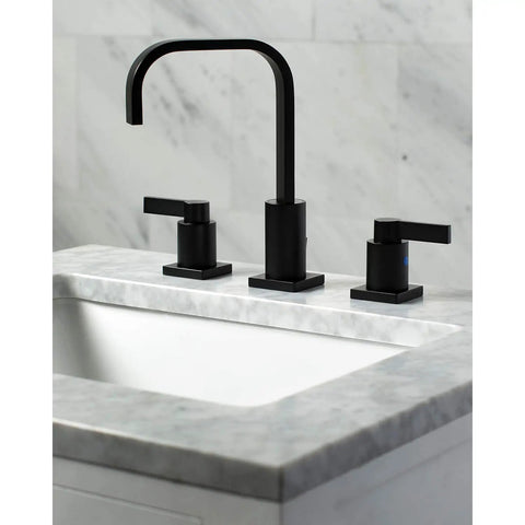 Matte Black Widespread Bathroom Faucet With Pop Up Drain, Solid Brass Construction, Drip Free Ceramic Disc on marble sink