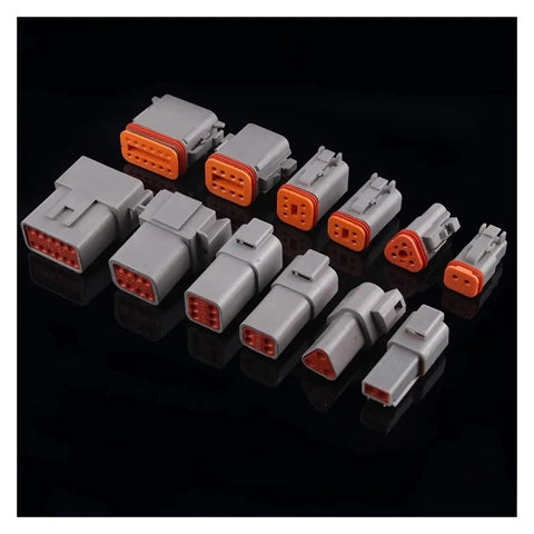Pro Grade Hella Weatherproof Auto Connectors With 18 AWG 15Cm Wires For Rock Solid Wiring Harness Repairs 12 Pin Male Female Spade Terminals Smooth Seal 100 Set Bulk Pack gray automotive connectors displayed on black background.