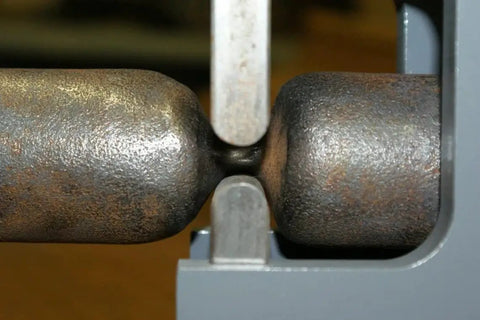 Guillotine Tool Set For Blacksmithing 5 Piece Fullering And Slashing Dies For Round Or Square Shoulders in use on metal