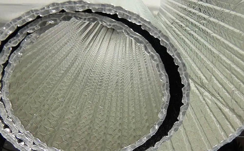 Top Shelf Extra Thick Double Bubble Reflective Foil Insulation Roll Badass Aluminum Radiant Heat Barrier Shield for Wall Attic Air Duct. Close-up view.