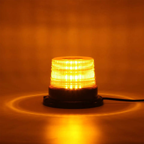 Top Tier Amber LED Strobe Light With Hella Bright Visibility And Rock Solid Magnetic Base For Zero Hassle Plug And Play Install On Work Trucks Or Trailers, illuminated close-up.