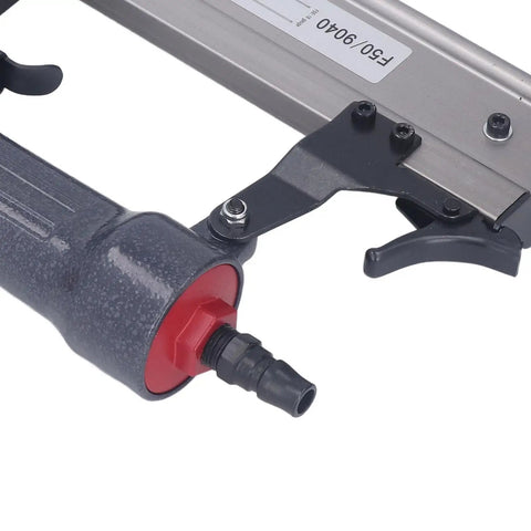 Close-up of the handle and trigger of the Straight Shooting Pneumatic Brad Nailer And Air Stapler 2 In 1 Design with ergonomic grip.
