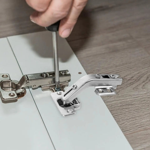 Installing stainless steel corner cabinet door hinges 135 degree soft close brushed finish concealed mounting on a white cabinet panel