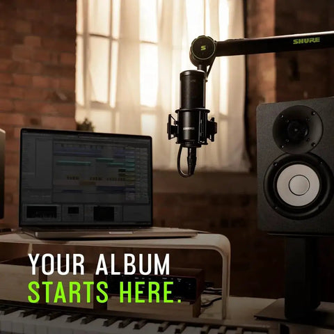 Studio Quality Condenser Microphone Kit For Home Recording With XLR in a studio setup with computer and speakers.
