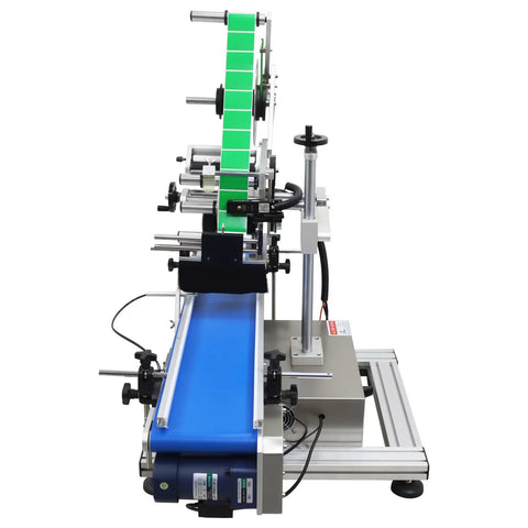 Top Shelf Automatic Desktop Conveyor Labeling Machine Engineered For Zero Stress Workflows On Cosmetics Food And Containers Fast Plug Into Standard Outlet For Smooth Flat Surface Application That Truly Delivers, showcasing blue conveyor and green label roll.